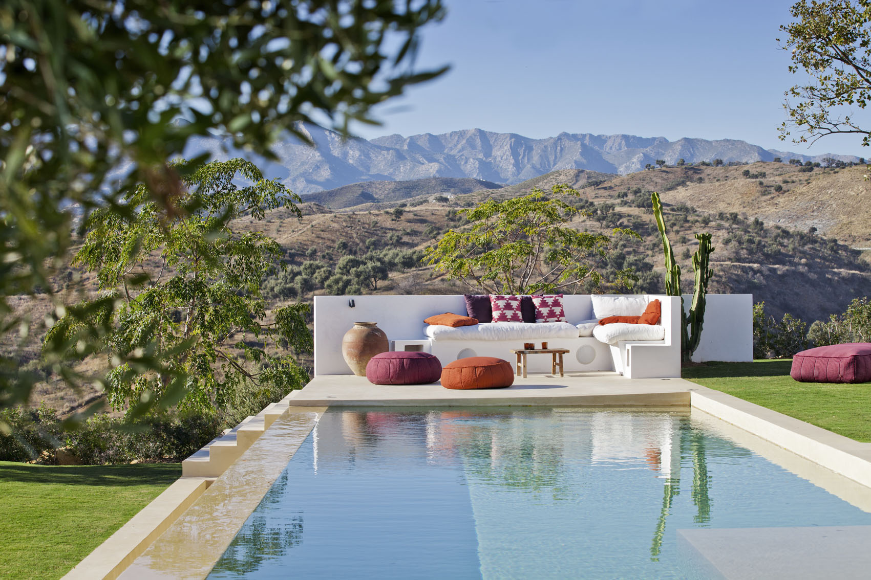 Infinity pool with a Mountain view, Texas, Colorado, Outside lounge, poolside, Marbella, Andalucia, Arizona feel, desert, olive groves, Poofs, Cushions