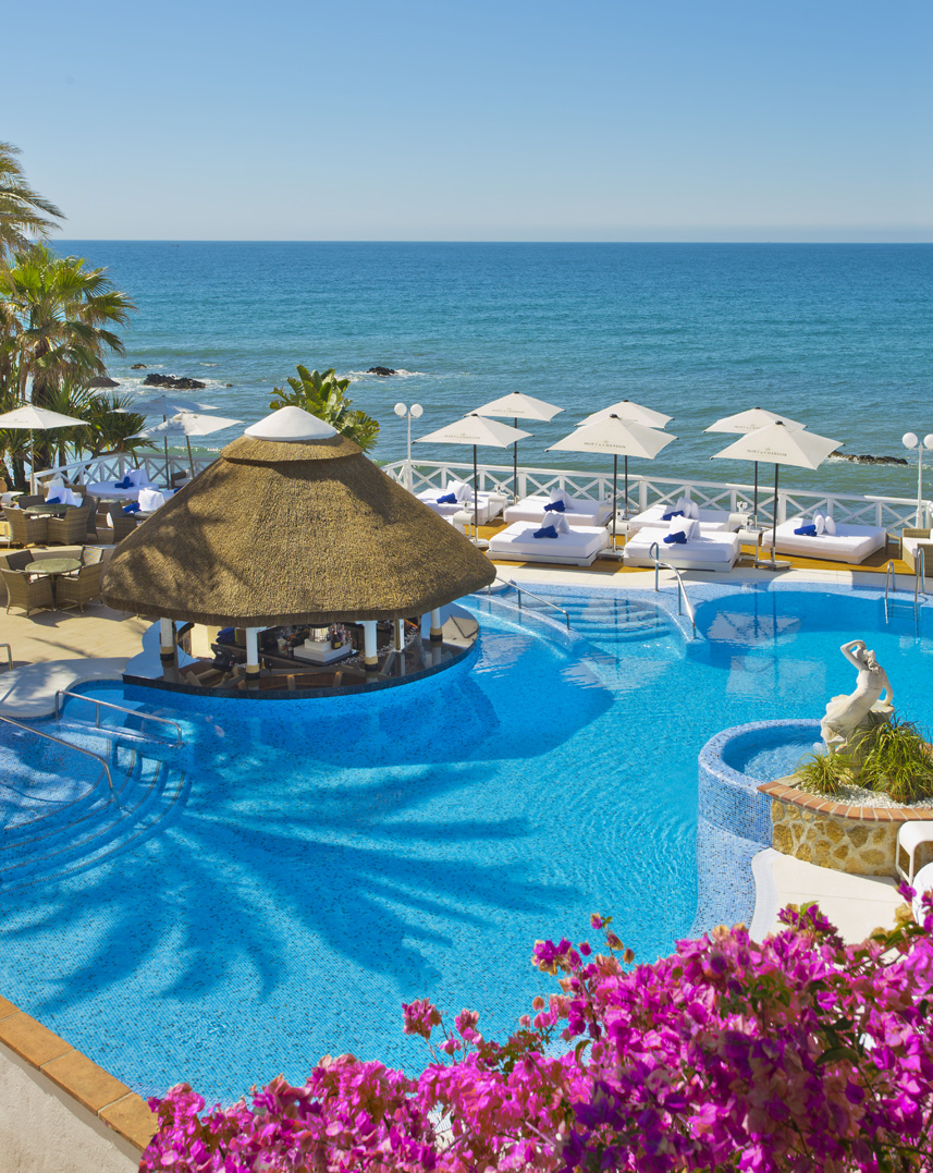 Oceano Hotel La Cala, Summer Holidays La Cala de Mijas,Moet y Chandon Umbrellas, Pool Bar